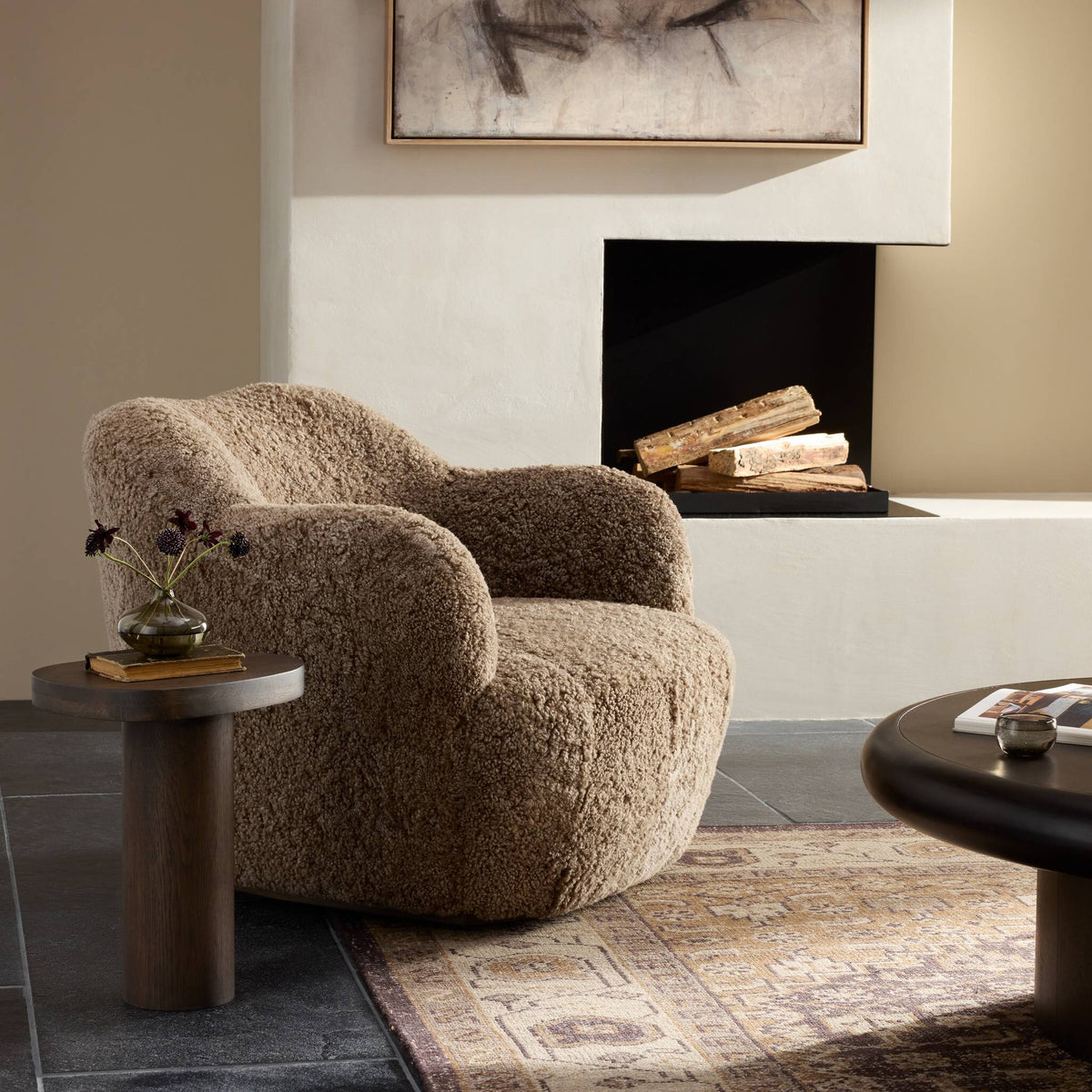 Taupe shearling Poppy Swivel Chair with plush texture in a cozy living room setting.