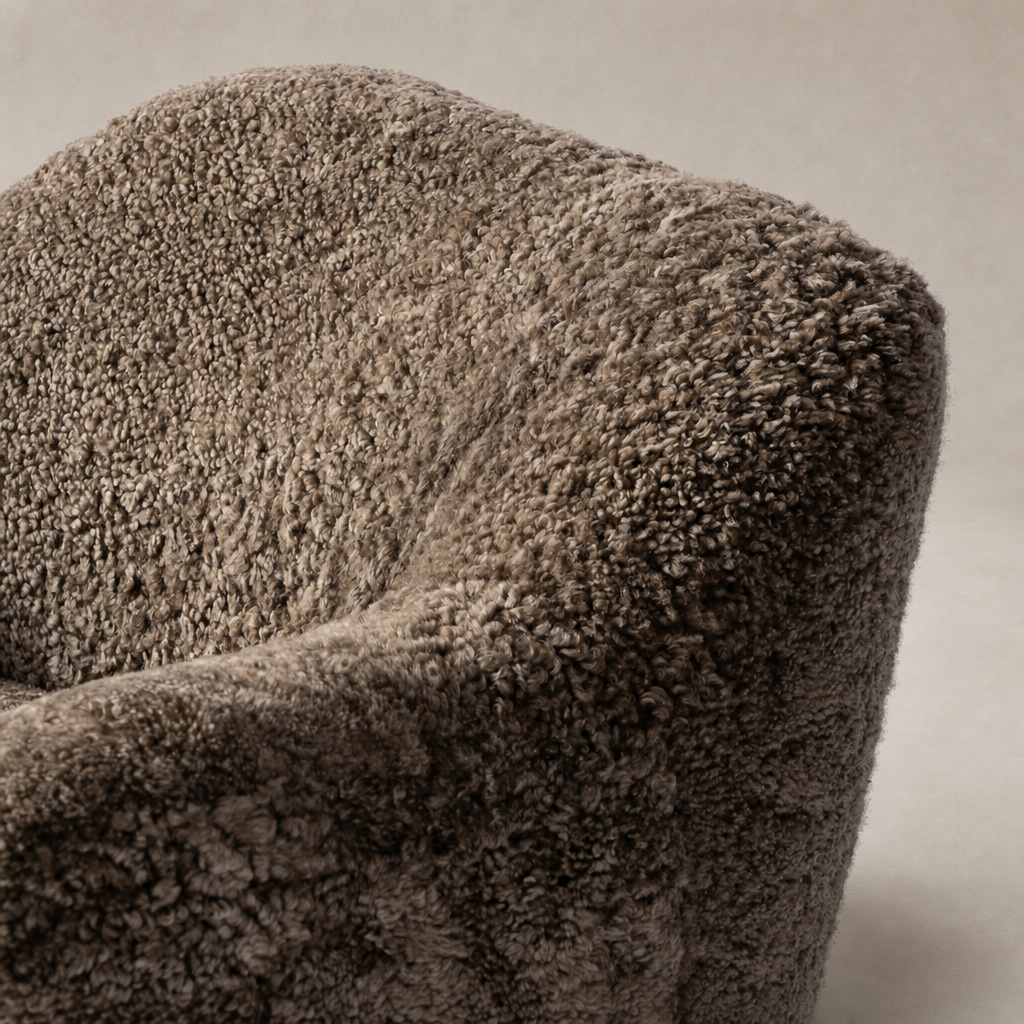 Taupe shearling texture of the Poppy Swivel Chair showcasing its cozy, plush design.
