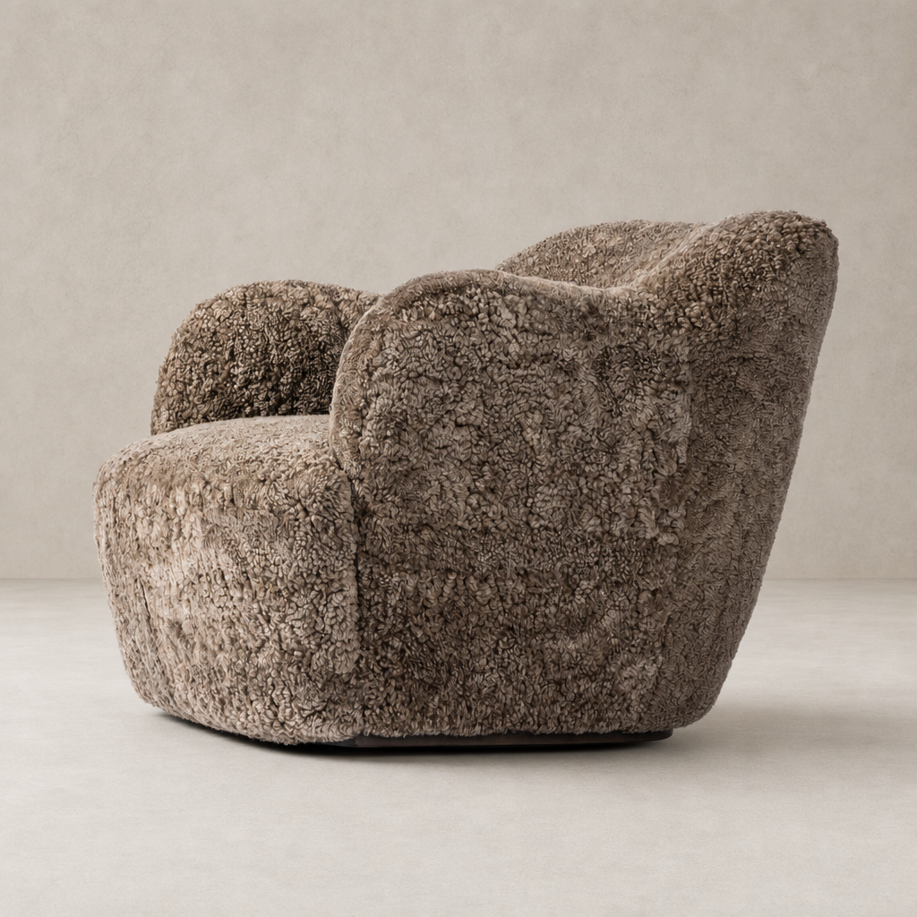 Taupe shearling Poppy Swivel Chair with plush texture and rounded arms.