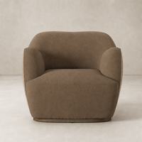 Poppy Swivel Chair in Fallingbrook Cafe features a rounded design with plush upholstery.