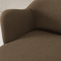 Close-up of the Poppy Swivel Chair in Fallingbrook Cafe, showcasing the soft textured fabric.