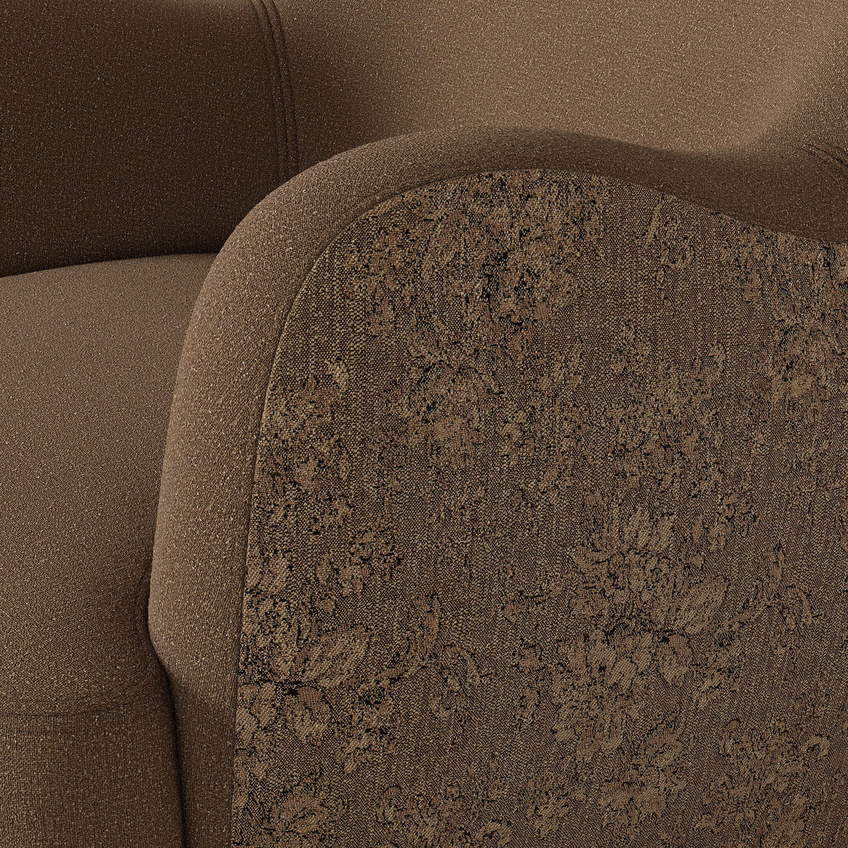 Close-up of the Poppy Swivel Chair in Fallingbrook Cafe showcasing textured fabric and floral patterns.