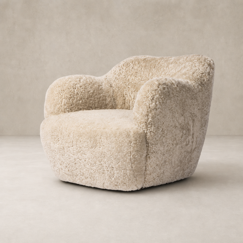 Beige shearling Poppy Swivel Chair with a plush, rounded design and cozy upholstery.