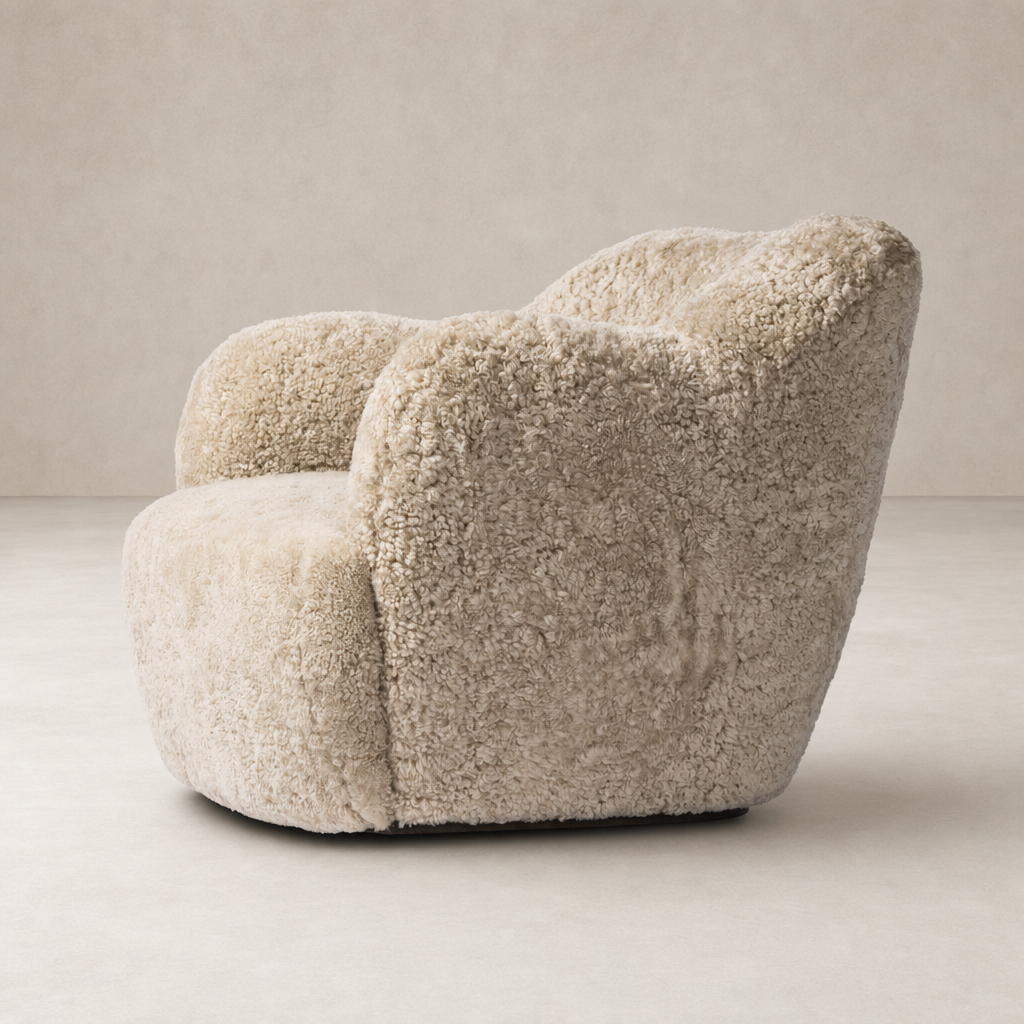 Beige shearling Poppy Swivel Chair with a soft, rounded design and plush texture.