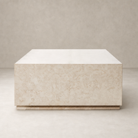 Ashland Outdoor Rectangular Coffee Table in outdoor cream marble with a sleek, modern design.