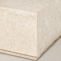 Textured outdoor cream marble corner of Ashland Outdoor Rectangular Coffee Table.
