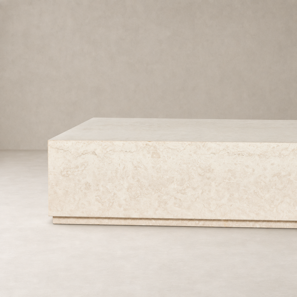 Ashland Outdoor Rectangular Coffee Table in outdoor cream marble with a sleek, modern design.