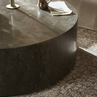 Milo Coffee Table in bluestone featuring a smooth, rounded top and textured finish.