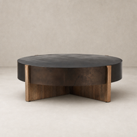Ashby Large Coffee Table in distressed iron with round top and sturdy wood base.