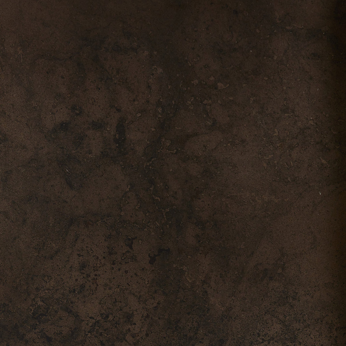 Close-up of the distressed iron surface of the Ashby Large Coffee Table.