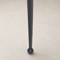 Brixton Nesting End Table Set featuring sleek, tapered legs with rounded feet.
