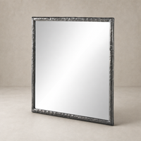 Bexley Wall Mirror with a textured smoked nickel frame reflecting a modern aesthetic.