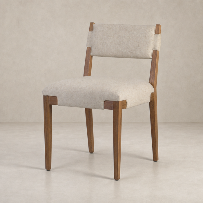 Nori Dining Chair in Antwerp Natural featuring clean lines and a cozy upholstery.