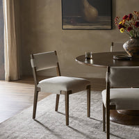 Nori Dining Chair in Antwerp Natural featuring an elegant design and soft upholstery.