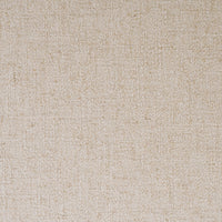 Detail of Nori Dining Chair's Antwerp Natural textured fabric upholstery.