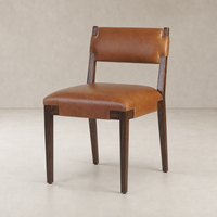 Nori Dining Chair in Sonoma Chestnut with sleek leather upholstery and sturdy wooden legs.