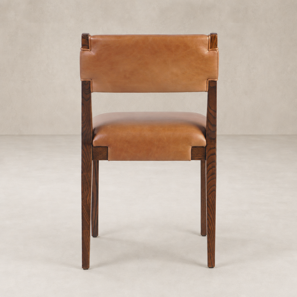 Nori Dining Chair in Sonoma Chestnut with sleek lines and soft leather upholstery.