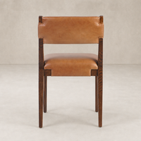 Nori Dining Chair in Sonoma Chestnut with sleek lines and soft leather upholstery.