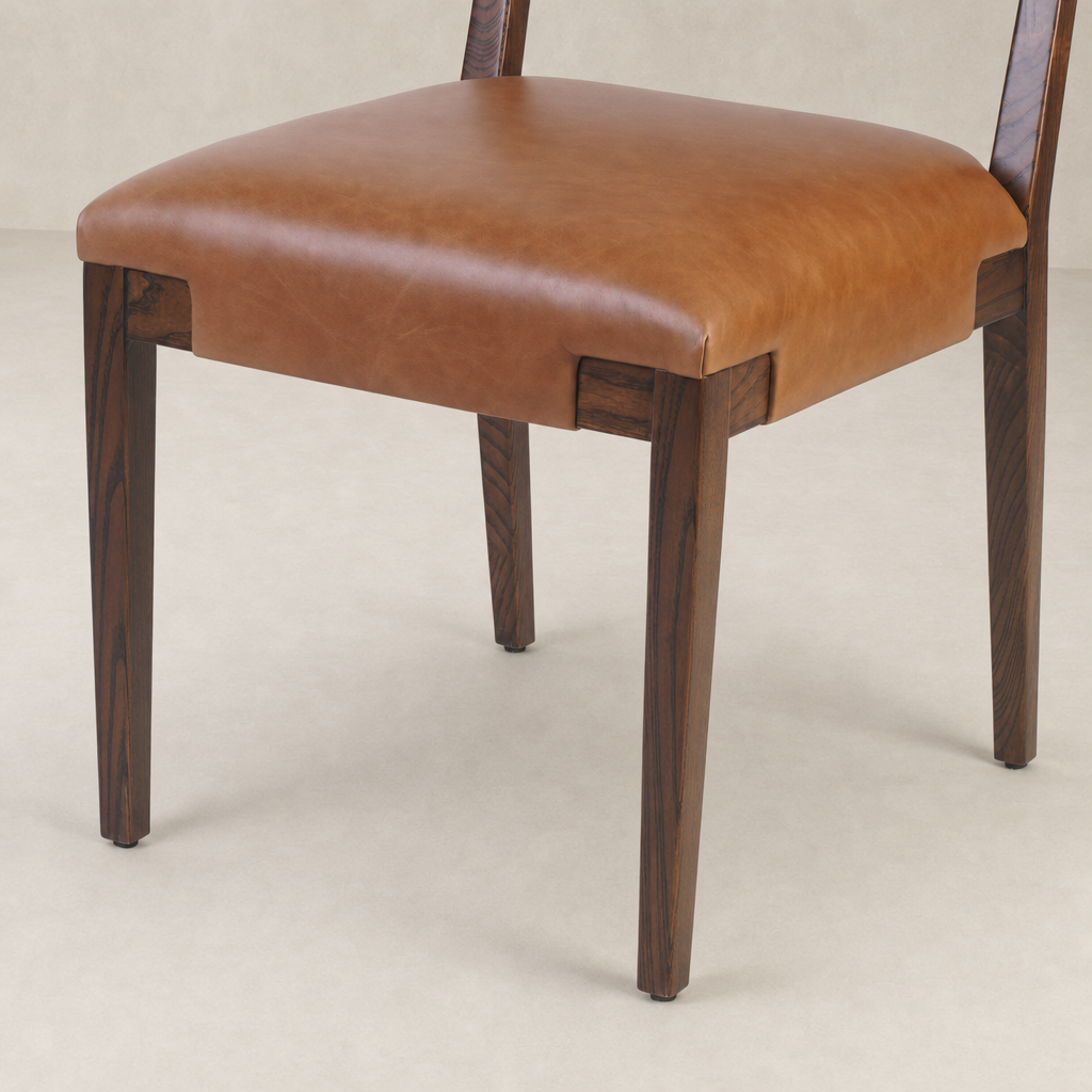 Nori Dining Chair with a Sonoma Chestnut finish and soft leather seat.
