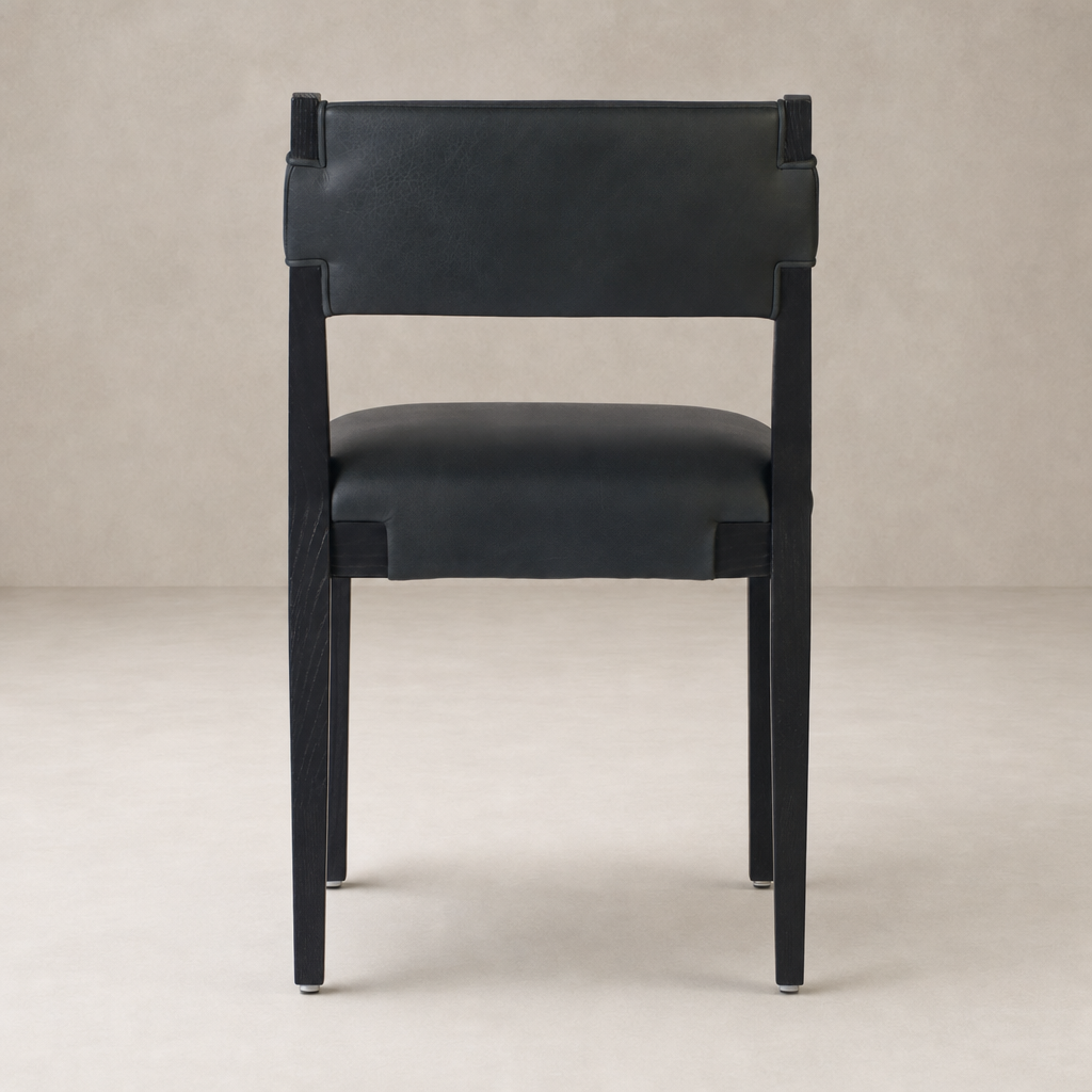 Nori Dining Chair in Brickhouse Black with a sleek, modern design and leather finish.