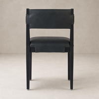 Nori Dining Chair in Brickhouse Black with a sleek, modern design and leather finish.