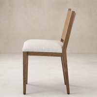 Celeste Dining Chair in Dover Crescent showcases a simple modern design with sturdy wooden legs.