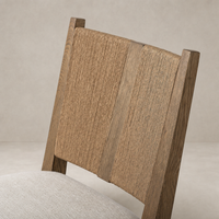 Celeste Dining Chair with textured Dover Crescent wood back and soft seat.