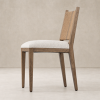 Celeste Dining Chair in Dover Crescent features a modern design with a textured seat and wood legs.