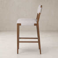 Bex Bar + Counter Stool in Antwerp Natural with sleek wooden frame and soft fabric seat.