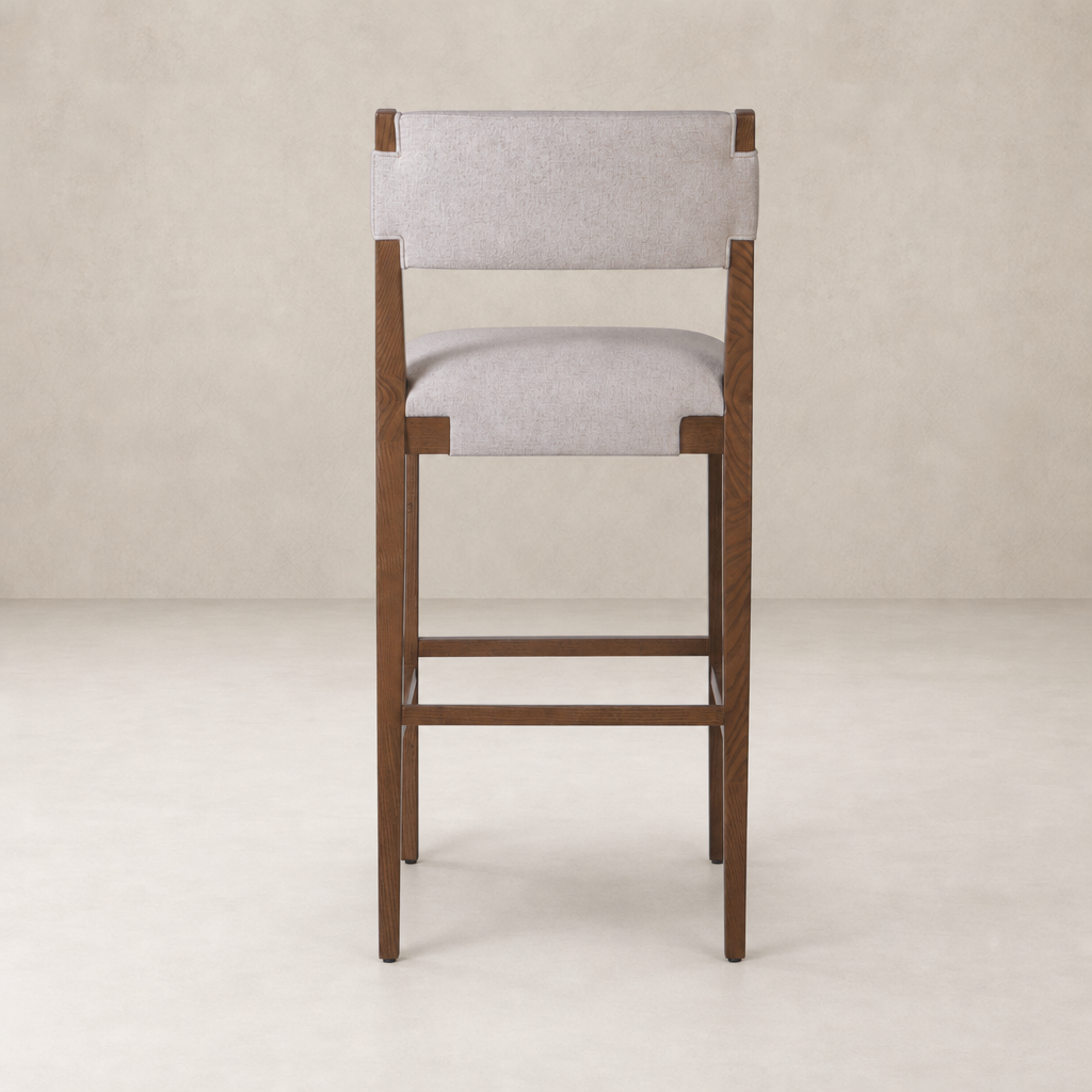Bex Bar + Counter Stool in Antwerp Natural with upholstered seat and backrest.