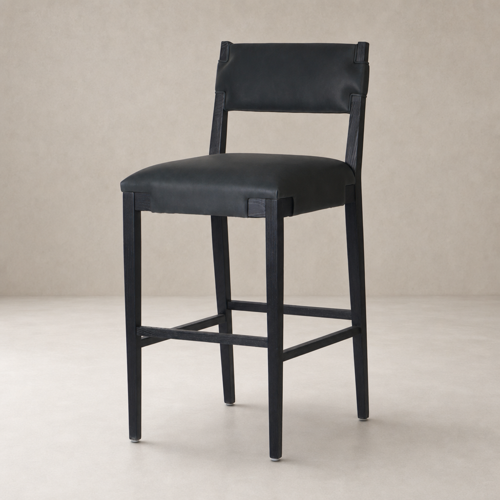 Bex Bar + Counter Stool in Brickhouse Black features a sleek design with a cushioned seat.