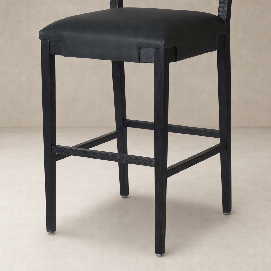 Bex Bar + Counter Stool in Brickhouse Black featuring a sleek design and sturdy legs.
