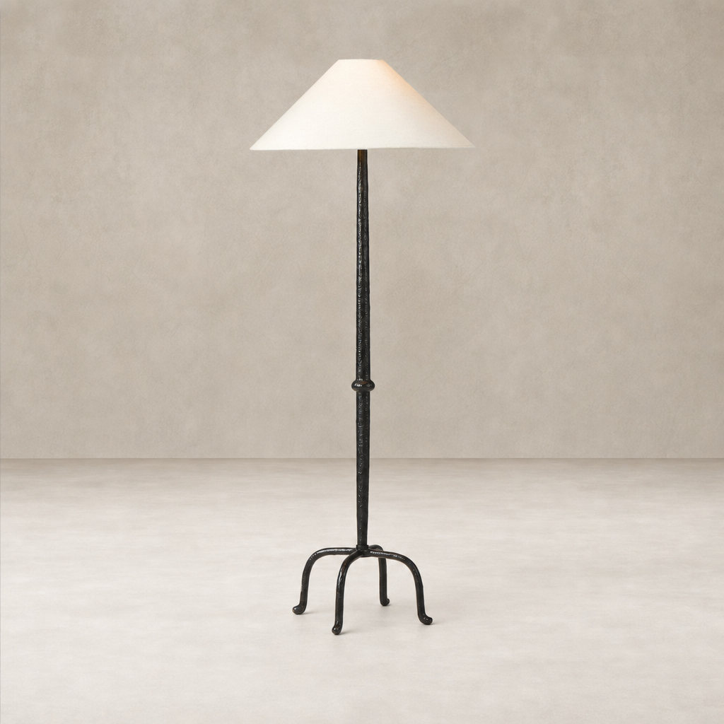 Matte black cast aluminum floor lamp with a stylish conical shade.