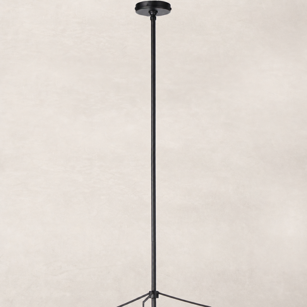 Matte black pendant light with a sleek, minimalist design and slender pole.