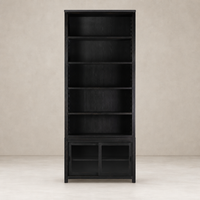Zanzibar Bookcase in worn black features open shelves and a sleek design.