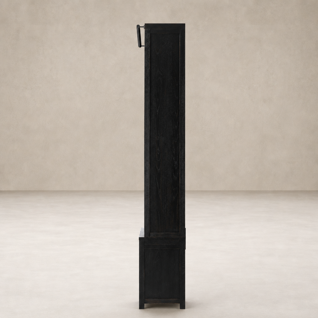 Zanzibar Bookcase in worn black featuring a sleek, vertical design and subtle texture.