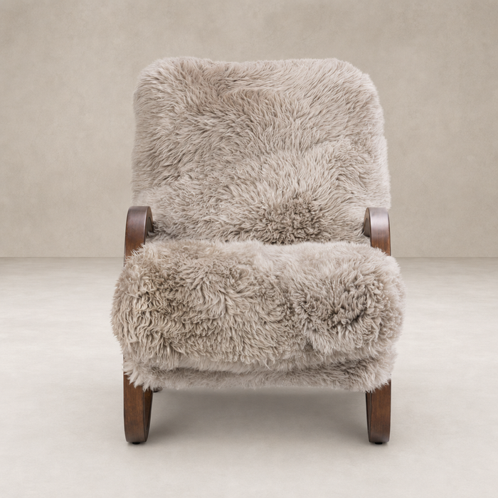 Livia Chair in taupe Mongolian fur with wooden armrests and plush texture.