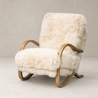 Livia Chair in champagne Mongolian fur with natural wood rocking base.