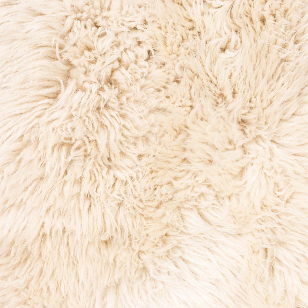 Champagne Mongolian fur texture from the Livia Chair, showcasing its soft, luxurious feel.