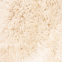 Champagne Mongolian fur texture from the Livia Chair, showcasing its soft, luxurious feel.