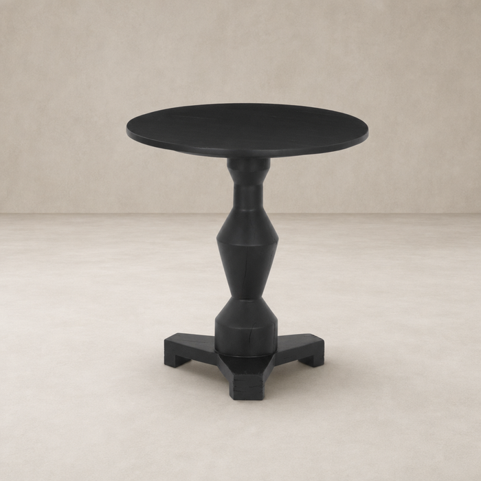 Black Neri End Table with round top and geometric base design.