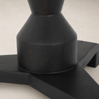 Neri End Table featuring a bold black finish and geometric base design.