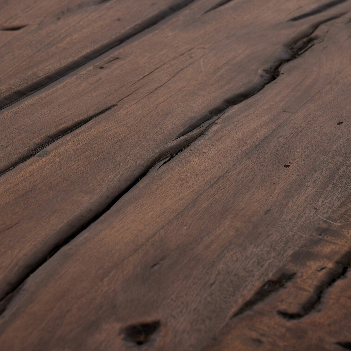 Close-up view of the Riva Large End Table's rich, textured wooden surface.