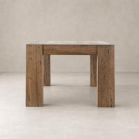 Rustic Wormwood Oak Brisa Dining Table with sturdy, thick legs and a textured finish.