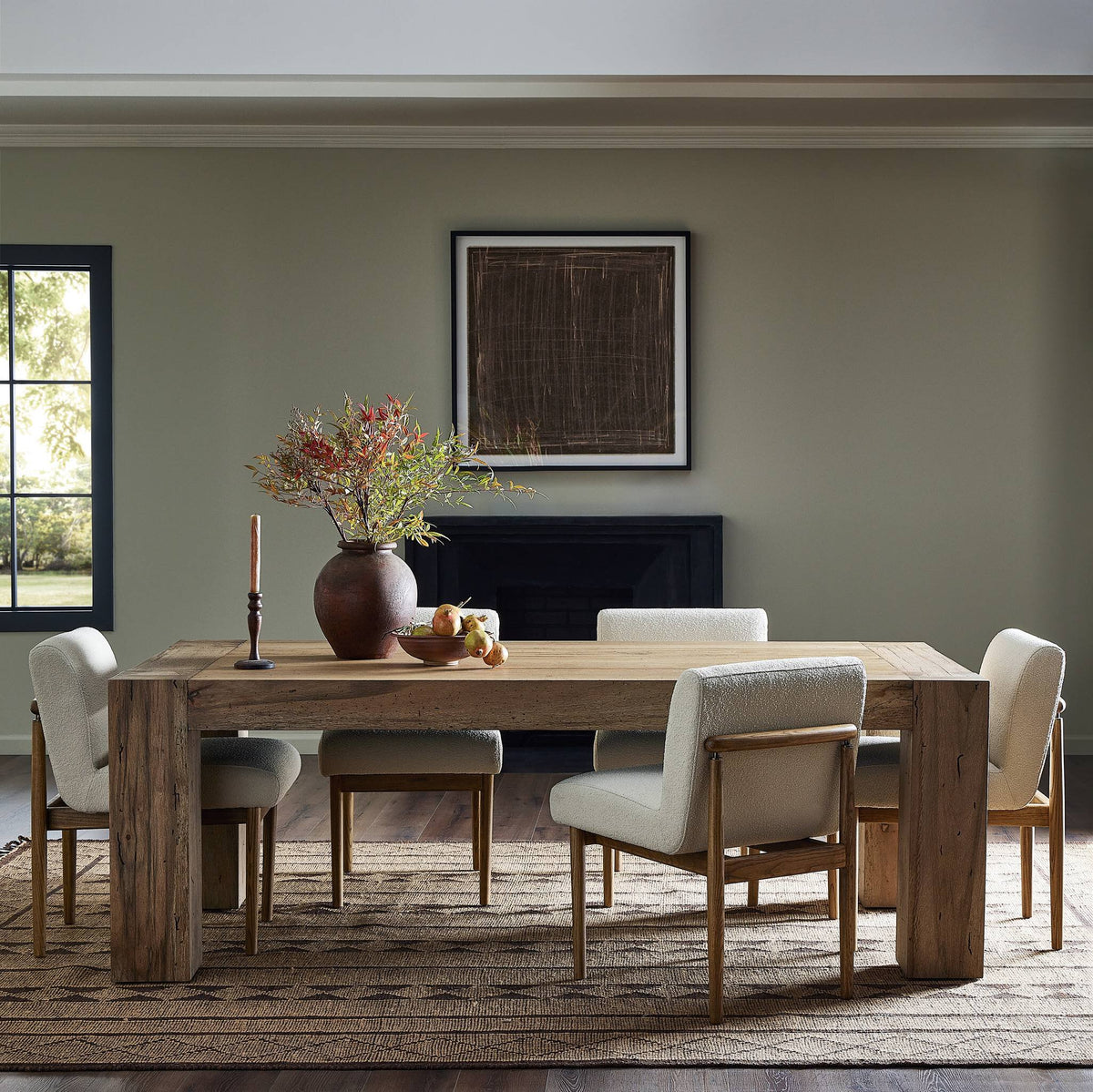 Rustic Wormwood Oak Brisa Dining Table with sturdy legs and styled candles.