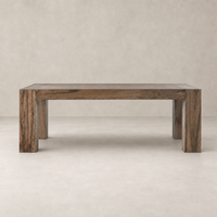 Brisa Dining Table in Rustic Wormwood Oak with sturdy, blocky legs and a smooth finish.