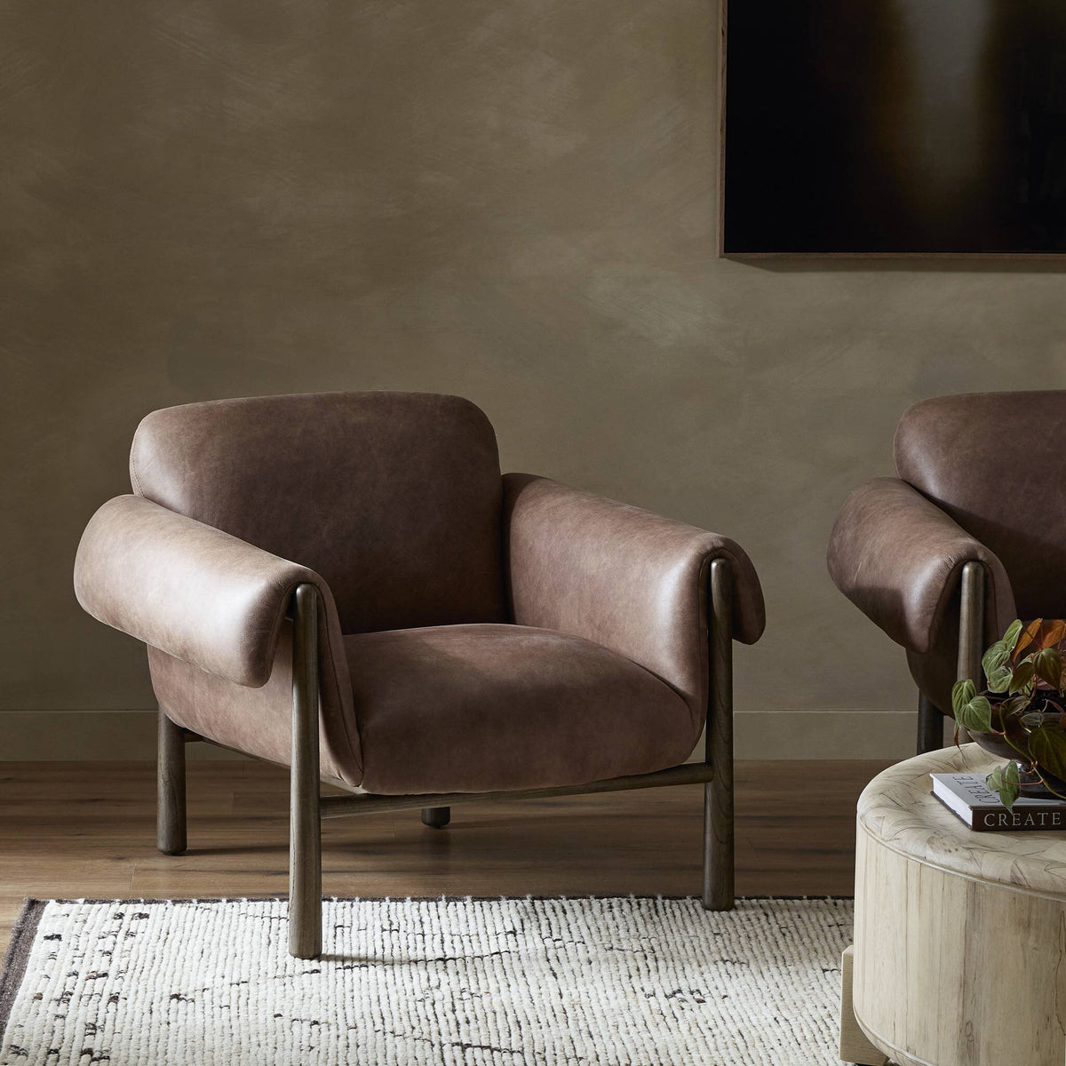 Bingham Chair in Palermo Cigar with soft curves and metal frame.