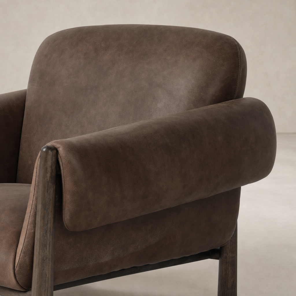 Bingham Chair in Palermo Cigar with soft, rounded arms and rich leather texture.