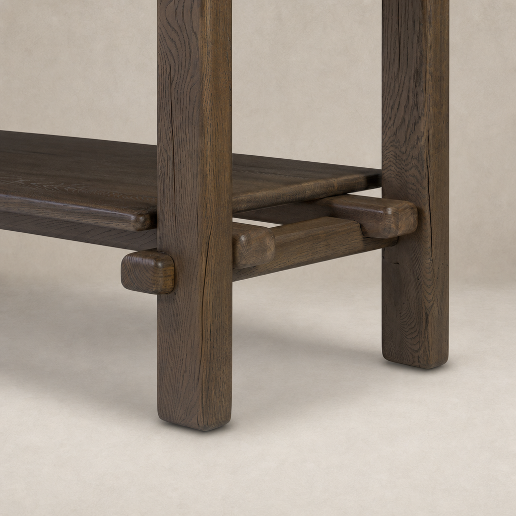 Detailed view of the Maeve Console Table in grey reclaimed French oak, showcasing sturdy legs and elegant finish.