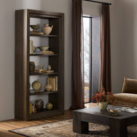 Montez Bookcase in weathered hazel oak, showcasing open shelves and elegant design.